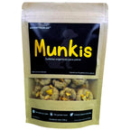 Empaque de galletas para perros de res con manzana vista frontal